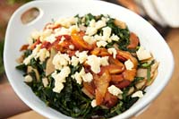 Kohlrabi and kale salad with farmer's cheese and grilled peach