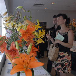 PHOTO: young couple looking at daylilies