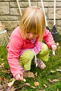 PHOTO: little girl working in her yard