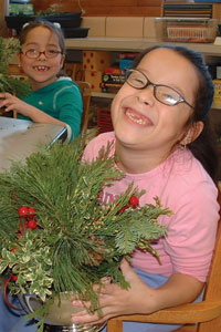 PHOTO: girls potting plants