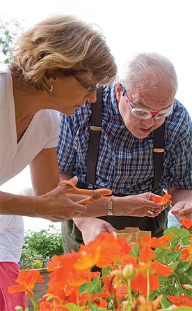 PHOTO: Tending nasturtium -- an edible flower -- in the Buehler Enabling Garden.