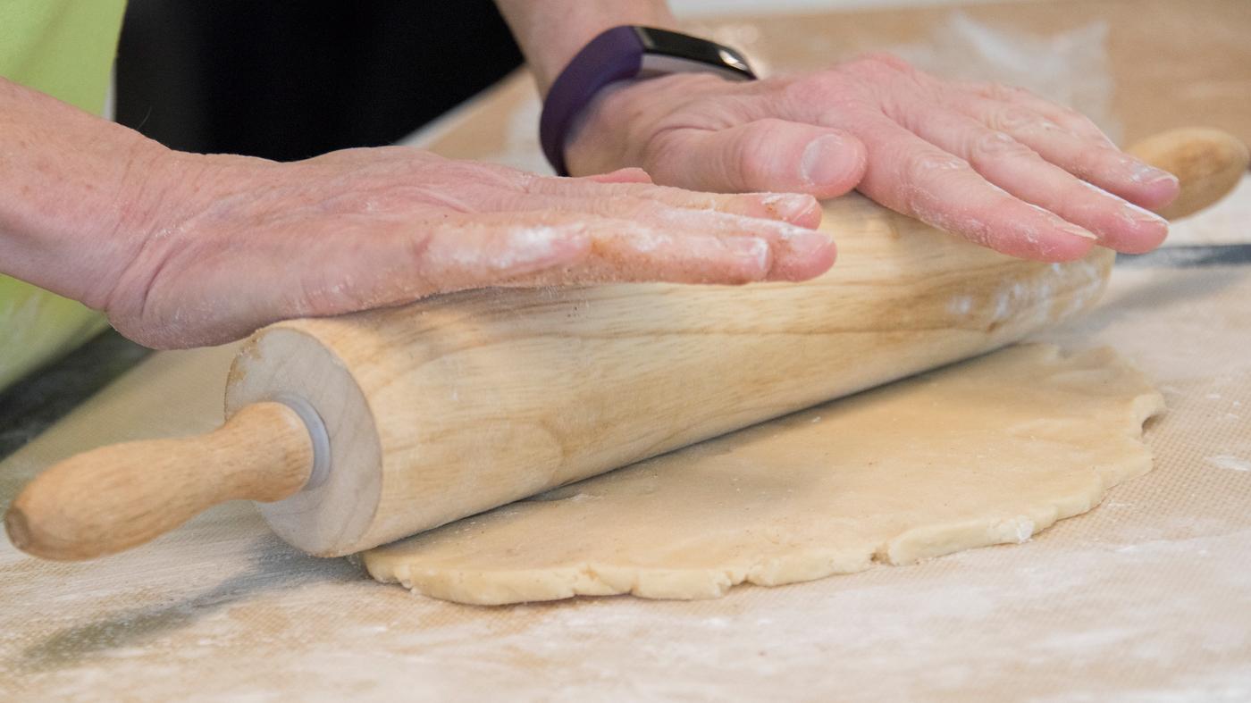 Making snacks with a rolling pin