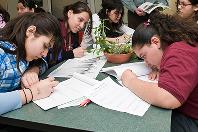 PHOTO: High schoolers report on data gathered in the field.