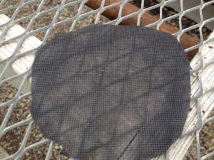 sheet of landscape fabric or weed barrier