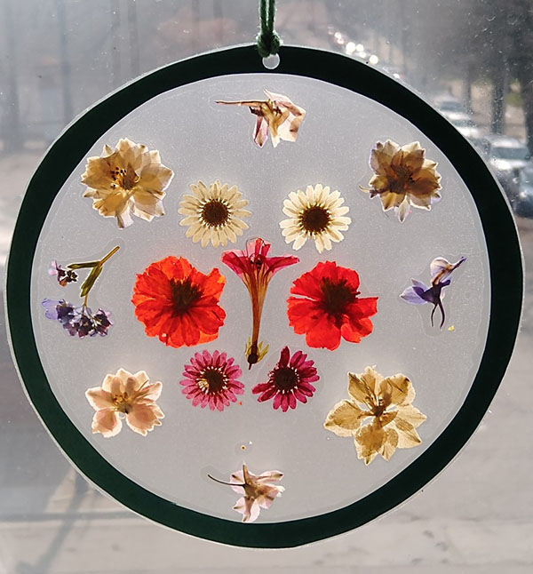 Pressed flower mandala sun catcher