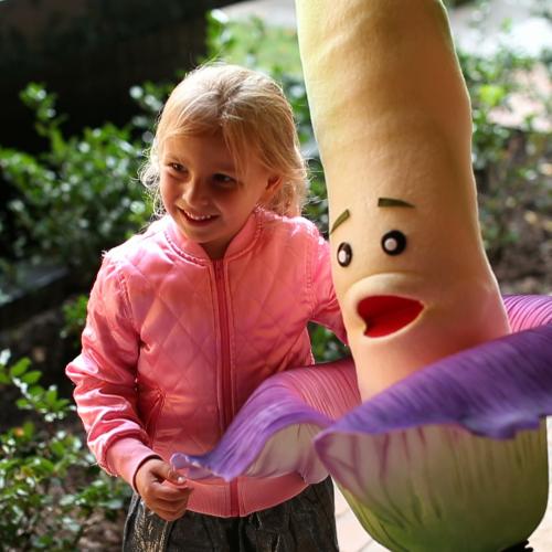 Girl with titan arum puppet